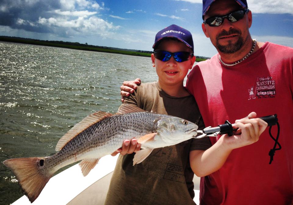 Gunnar's 23 inch redfish.jpg Gunnar's 23 inch redfish.jpg
